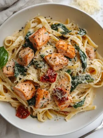 Marry Me Salmon Pasta served on a white plate
