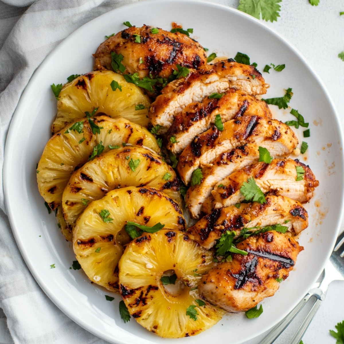 grilled pineapple chicken sliced and served with grilled pineapple