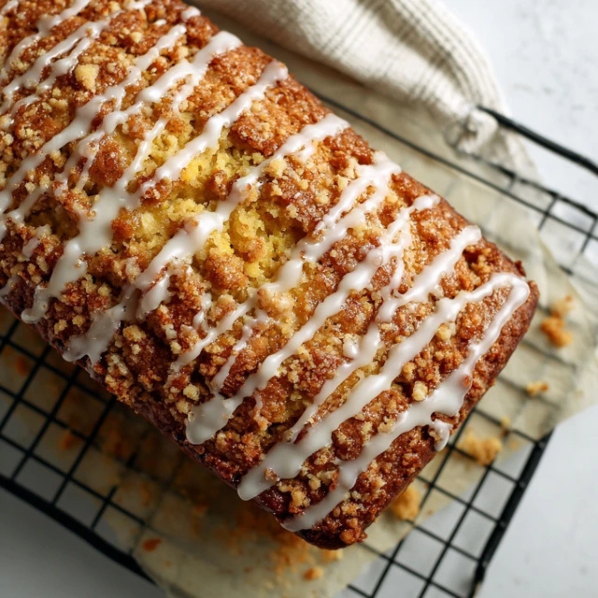 Glazed Southern peach bread cooling on wire rack