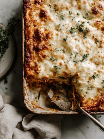 cheesy baked spaghetti squash casserole in baking dish