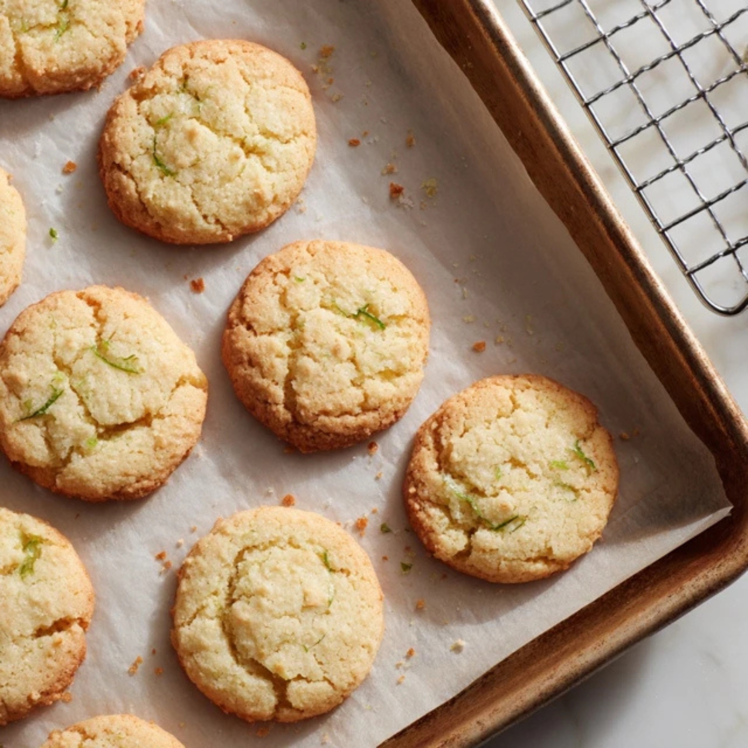 Freshly baked key lime cookies on baking tray