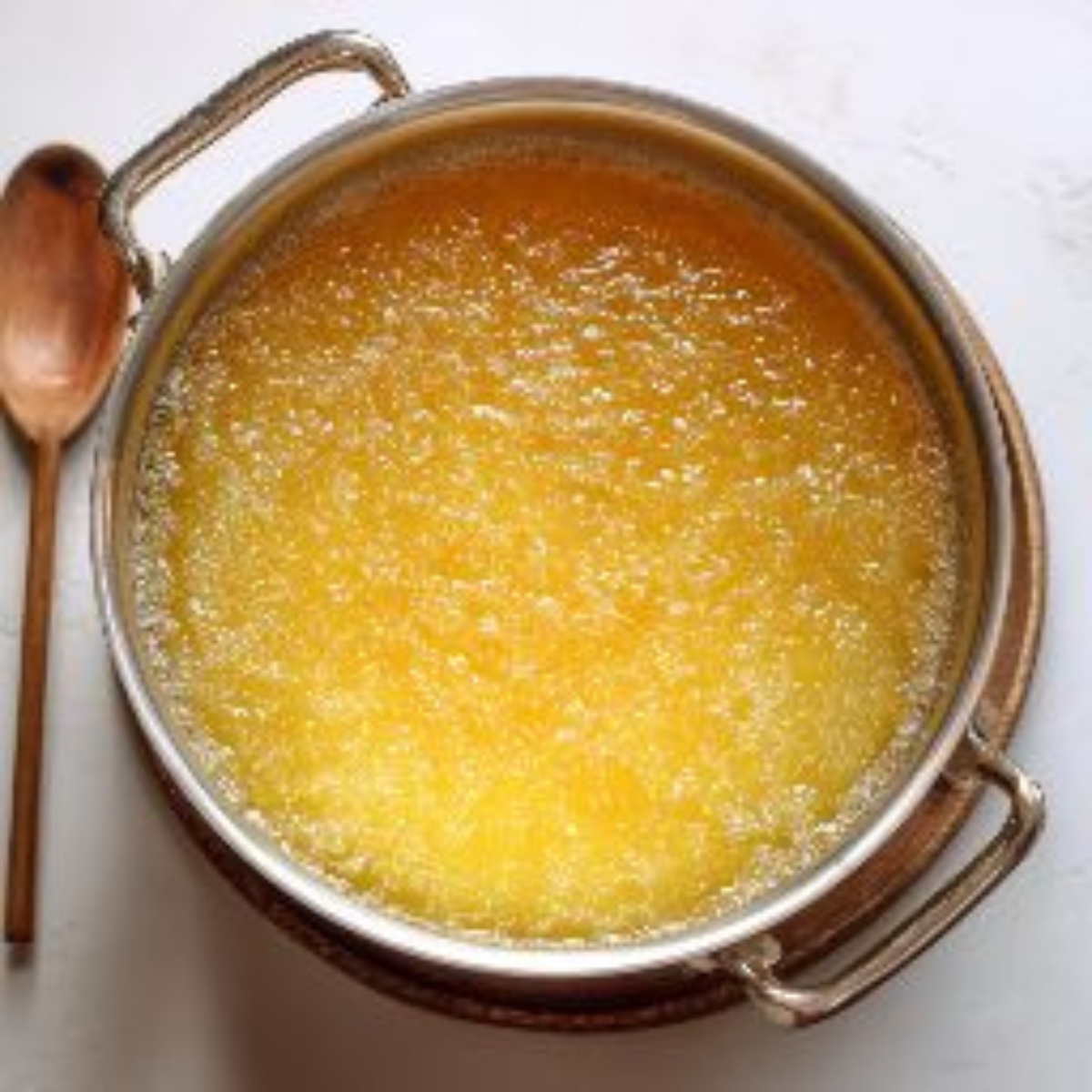  pot of bubbling peach jelly just off the heat