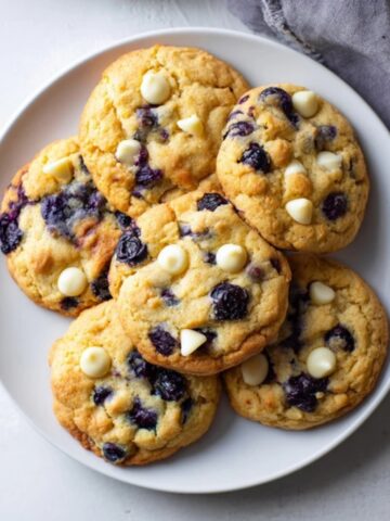 soft chewy blueberry heaven cookies on white counter