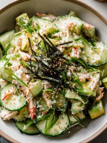 california roll cucumber salad with avocado crab and sesame seeds