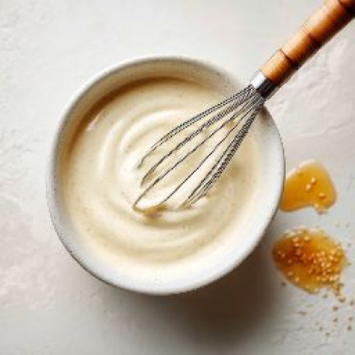 sesame mayo dressing in small bowl