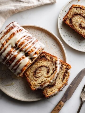 Homemade cinnamon roll zucchini bread with cream cheese glaze