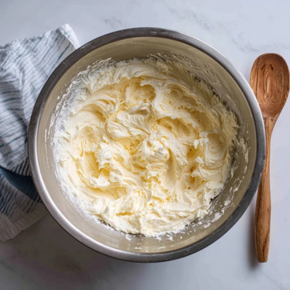 creamed butter sugar mixture in mixing bowl