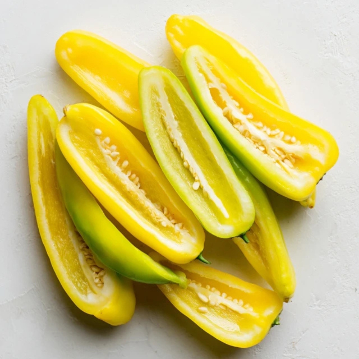  fresh banana peppers halved and deseeded on counter