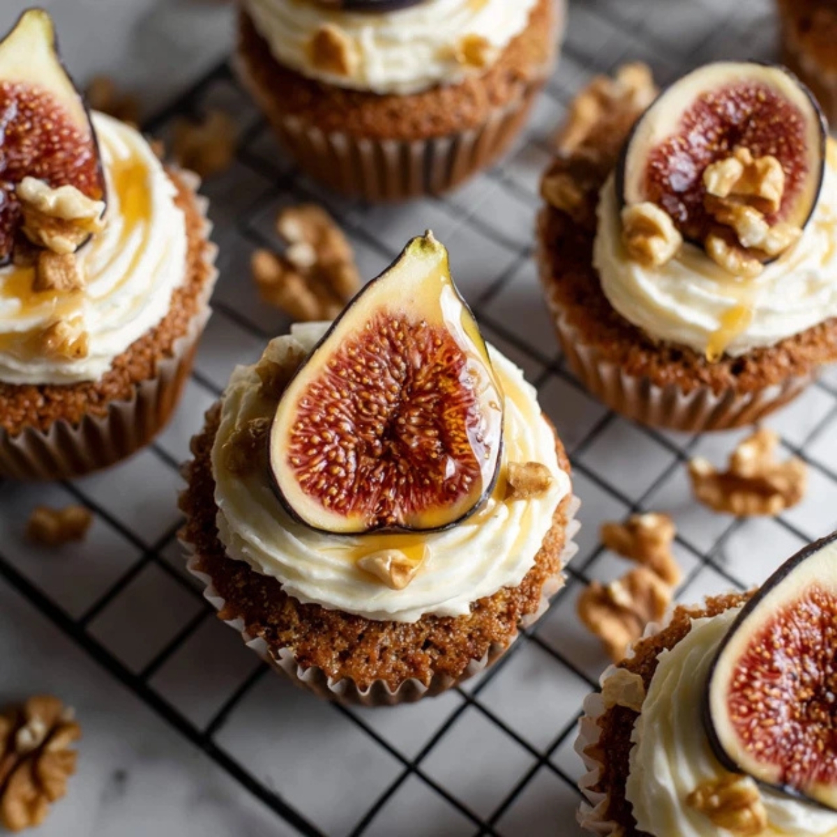 homemade fig cupcakes with cream cheese frosting and fig slices