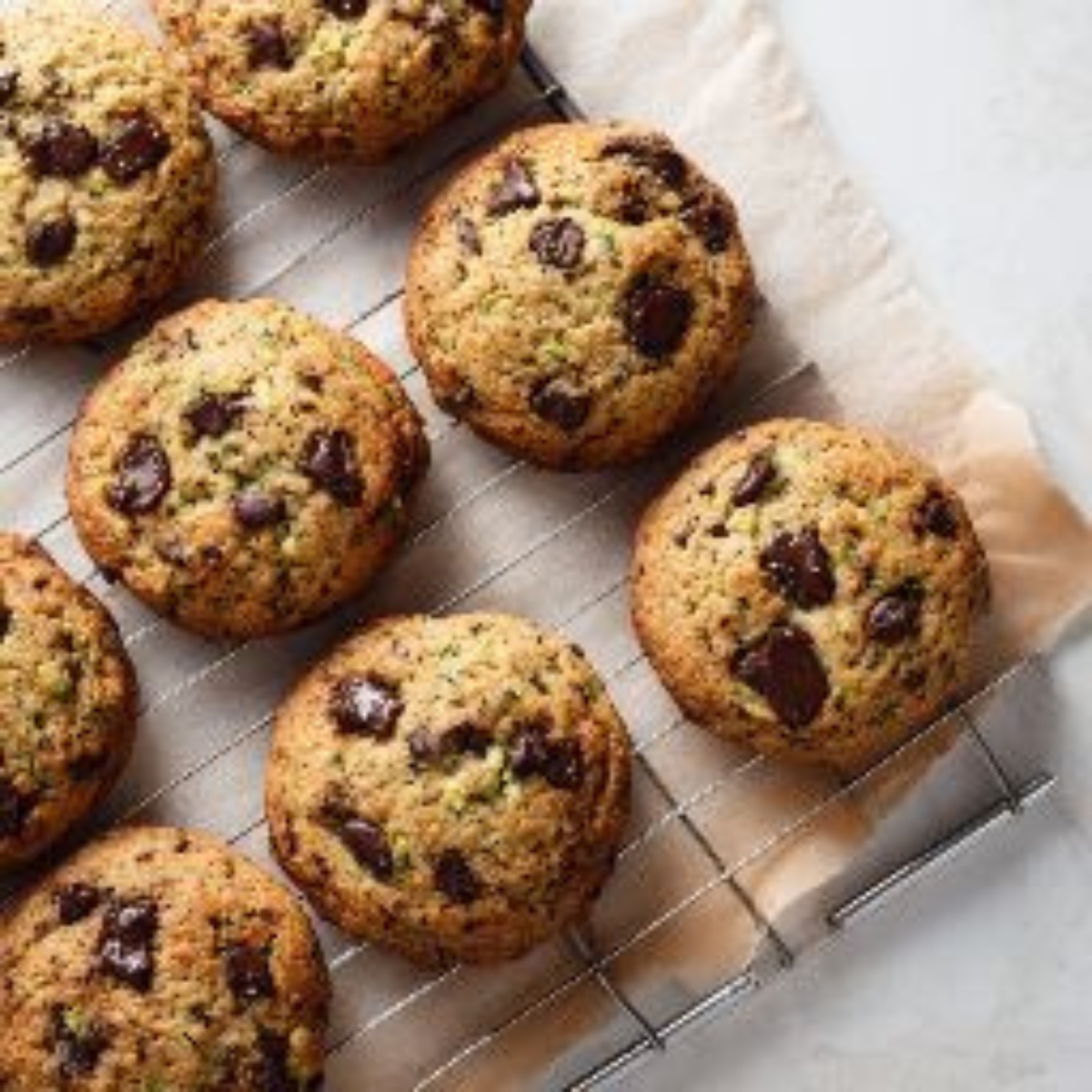 baked zucchini chocolate chip cookies cooling on rack