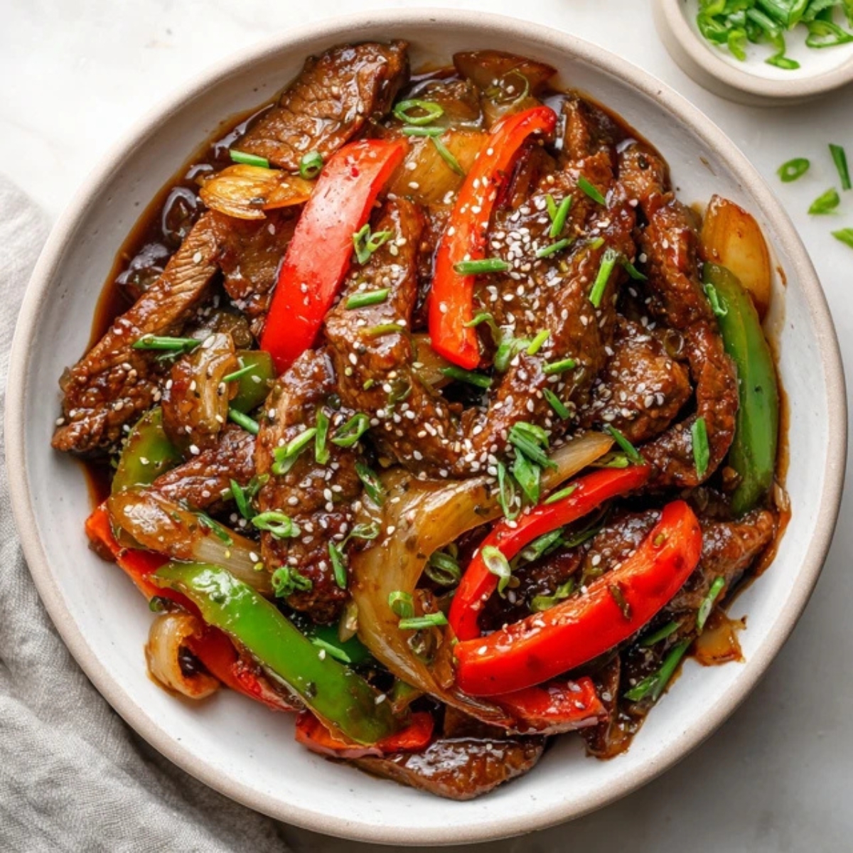 Homemade black pepper steak stir fry with peppers and onions