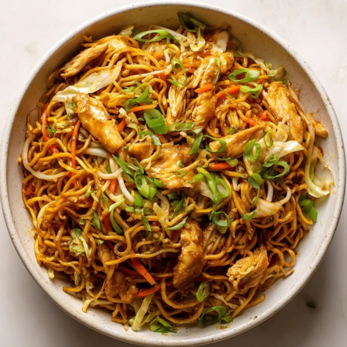 crispy chicken chow mein with noodles and vegetables