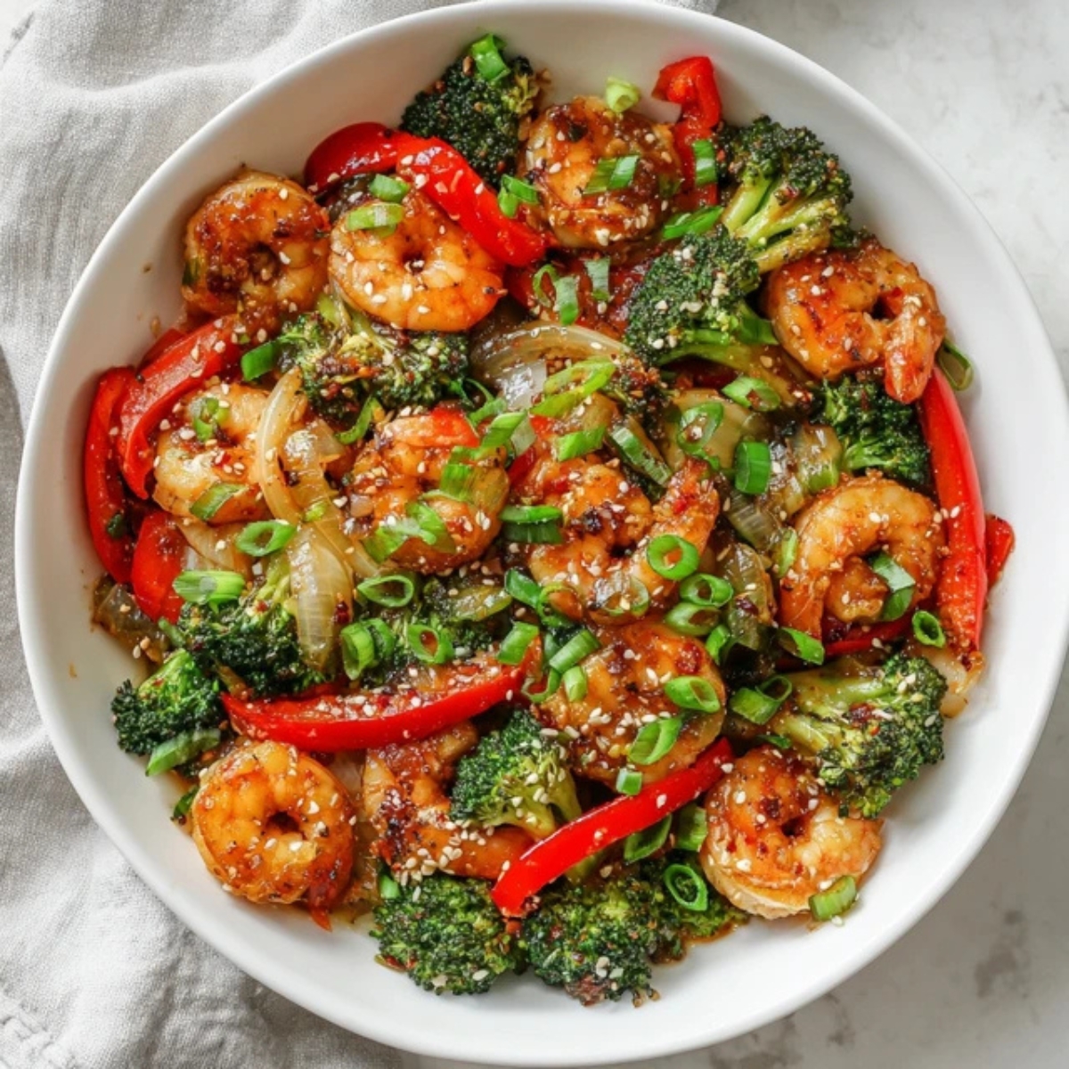 Garlic shrimp stir fry with broccoli and bell peppers in garlic sauce