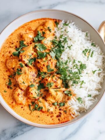 Instant Pot chicken tikka masala with rice and cilantro garnish