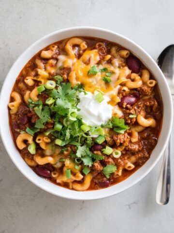 creamy Instant Pot chili mac with beans and cheese in a bowl