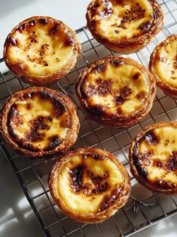 authentic portuguese custard tarts pastéis de nata on white counter