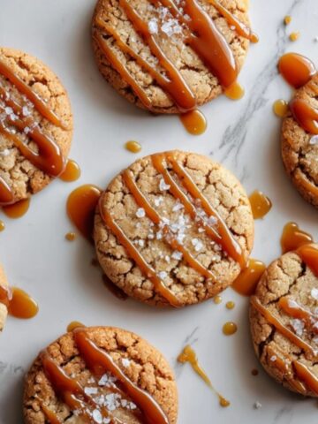 chewy salted caramel cookies with caramel drizzle