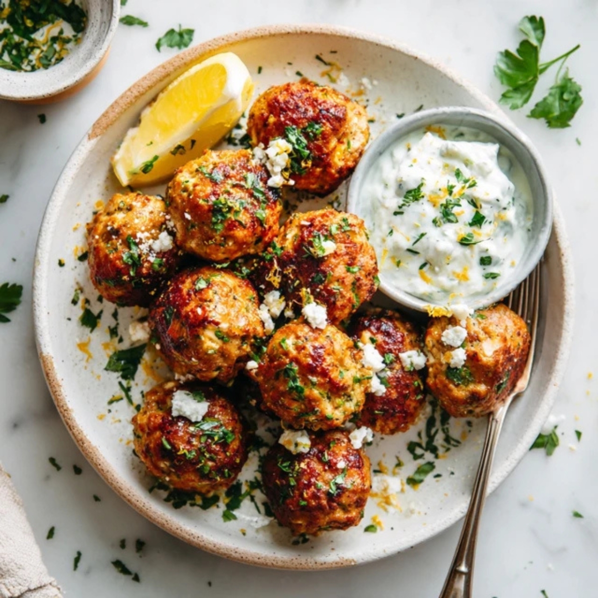 Mediterranean turkey feta meatballs with parsley and tzatziki