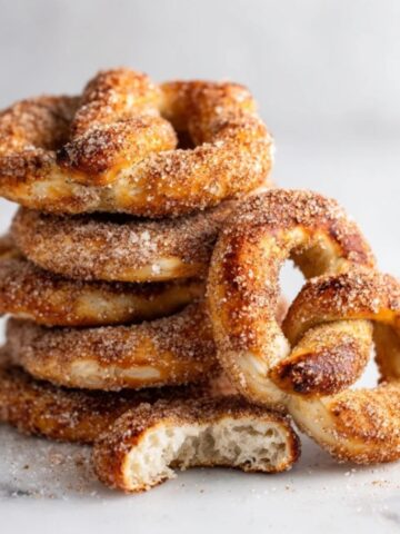 homemade cinnamon sugar soft pretzels on white kitchen counter