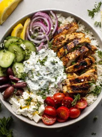 Greek Chicken Gyro Bowl with tzatziki, rice, and fresh Mediterranean toppings
